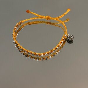 Pura Vida. Burnt Orange Braided Bracelet with Silver Beads